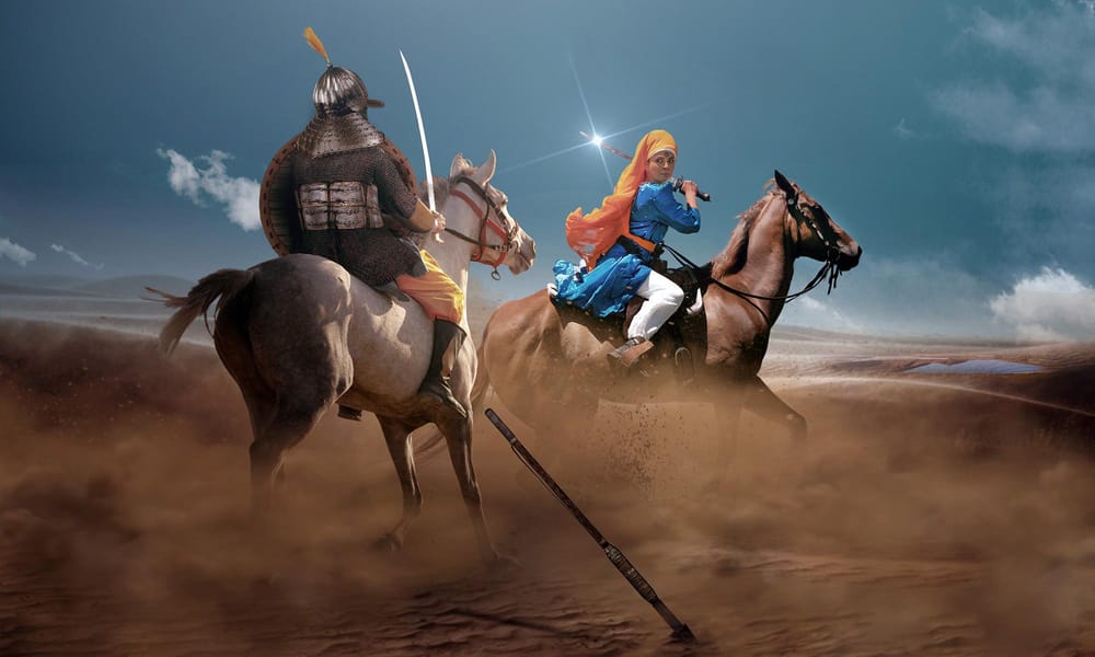 A photo of a Sikh woman riding a brown horse and holding a sword to defend herself against an incoming male soldier.