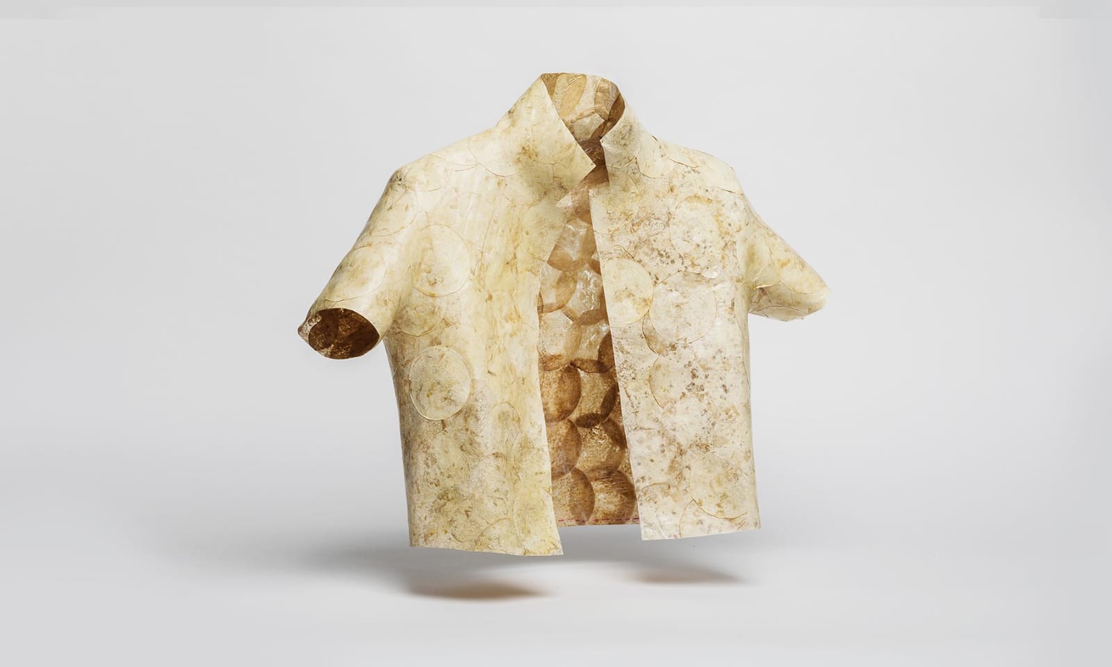 A photo of a cream and brown MycoTex seamless jacket design