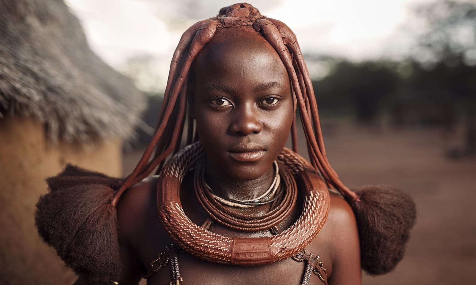 A photo of a Himba girl by Sean Tucker. 